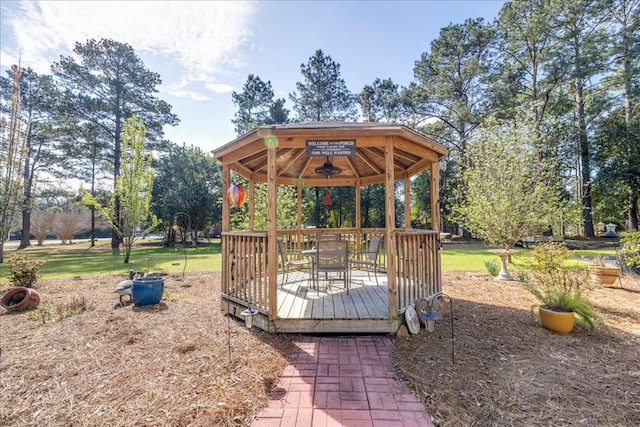 view of property's community with a wooden deck and a gazebo