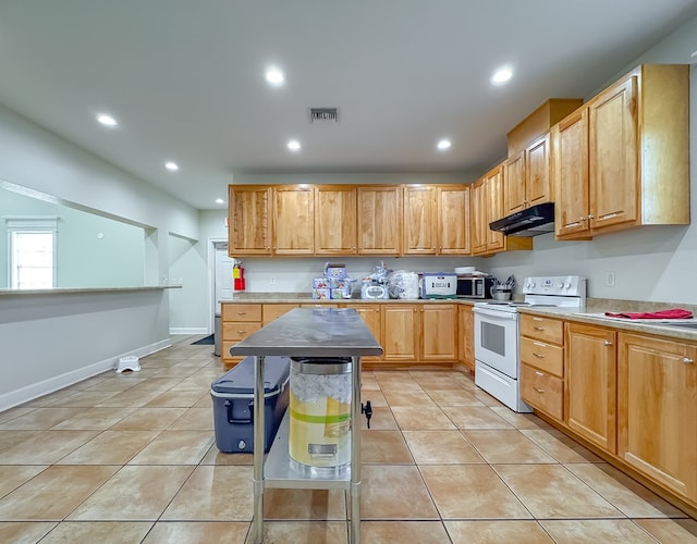 1101 Faceville Hwy, Bainbridge, GA 39819 - kitchen featuring white range with electric cooktop, under cabinet range hood, light tile patterned floors, light countertops, and recessed lighting