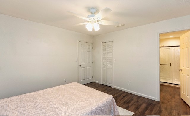 bedroom with ceiling fan, dark hardwood / wood-style flooring, and a closet