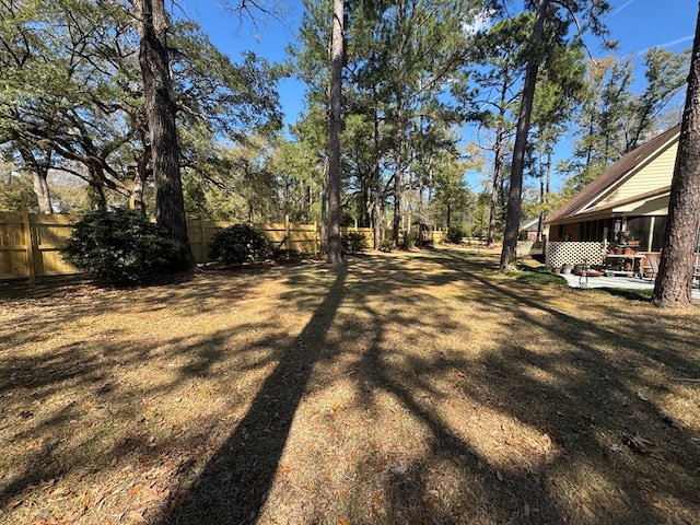 view of yard featuring a patio area and fence