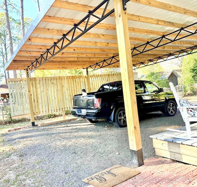 view of parking / parking lot with a carport