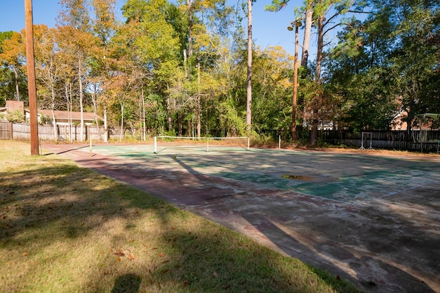 exterior space with tennis court