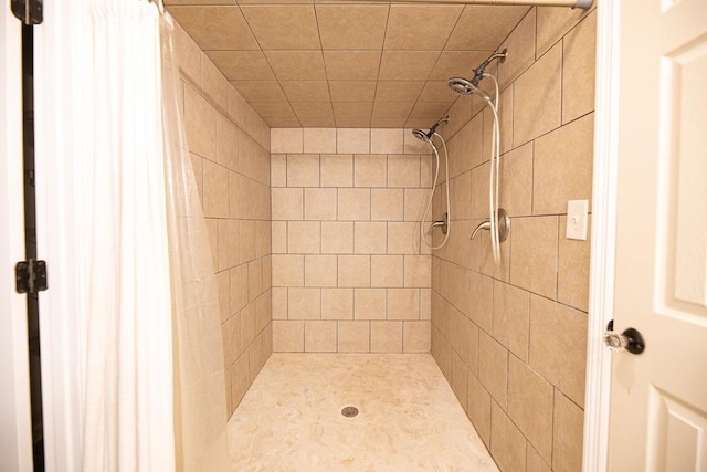 bathroom with curtained shower