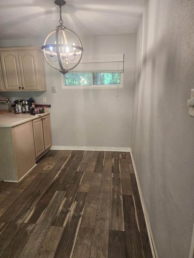358/356 Hull St, Colquitt, GA 39837 - unfurnished dining area with a chandelier and dark wood finished floors