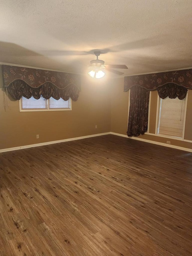 358/356 Hull St, Colquitt, GA 39837 - unfurnished room featuring a textured ceiling, wood finished floors, and a ceiling fan