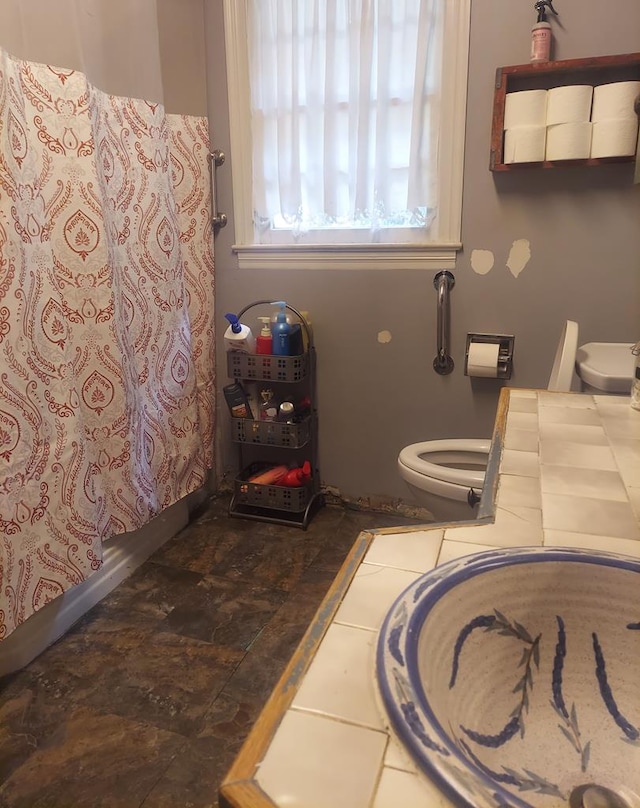 910 S Broad St, Cairo, GA 39828 - full bath with toilet and curtained shower