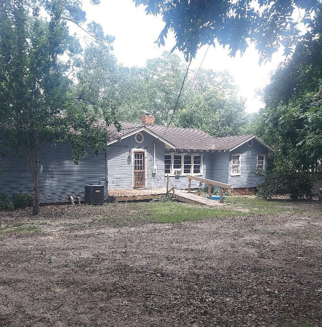 910 S Broad St, Cairo, GA 39828 - back of house featuring a chimney