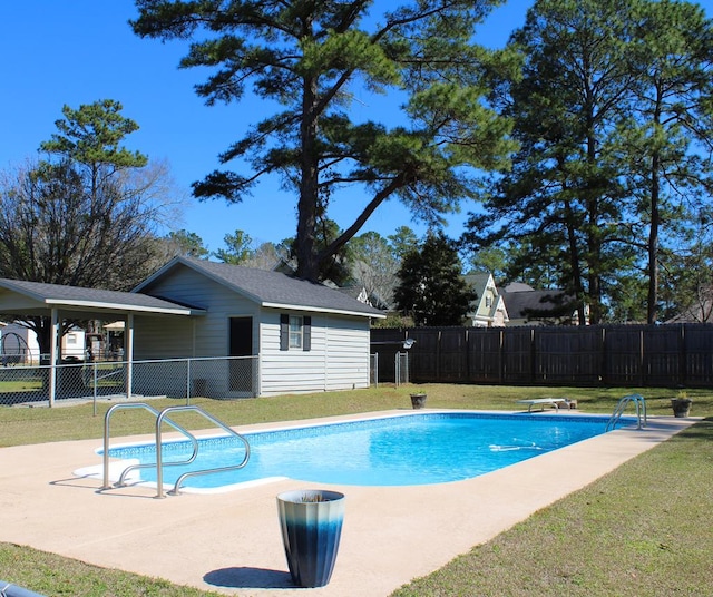 view of pool featuring a fenced in pool, fence, a lawn, and a patio