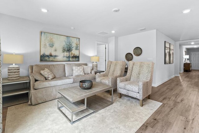 177 Wynn Ct, Bainbridge, GA 39819 - living room with baseboards, wood finished floors, visible vents, and recessed lighting
