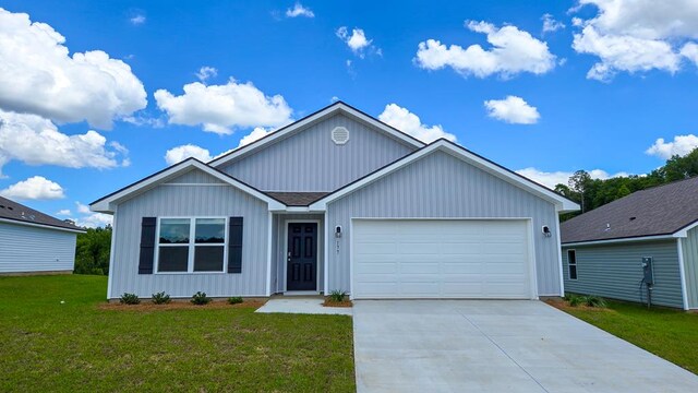 177 Wynn Ct, Bainbridge, GA 39819 - ranch-style house with a garage, driveway, board and batten siding, and roof with shingles