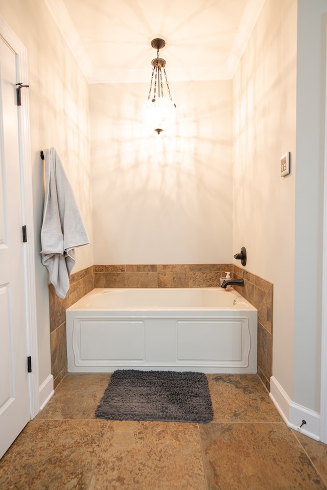 8030 Northwood Dr, Donalsonville, GA 39845 - bathroom featuring ornamental molding and a tub