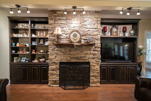 8030 Northwood Dr, Donalsonville, GA 39845 - living room featuring crown molding, a fireplace, and hardwood / wood-style flooring