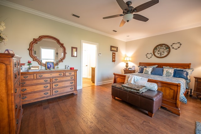 8030 Northwood Dr, Donalsonville, GA 39845 - bedroom with ceiling fan, dark hardwood / wood-style flooring, and crown molding