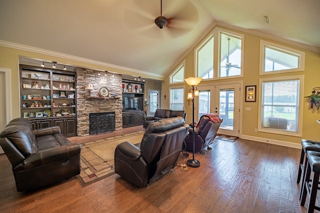 8030 Northwood Dr, Donalsonville, GA 39845 - living room featuring ceiling fan, french doors, built in features, hardwood / wood-style flooring, and ornamental molding