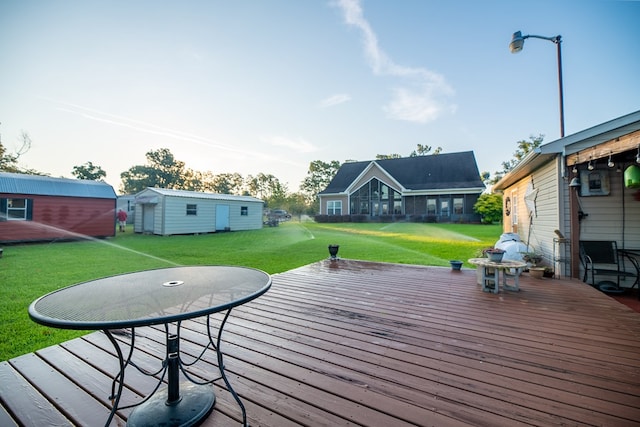 8030 Northwood Dr, Donalsonville, GA 39845 - deck featuring a lawn and an outbuilding