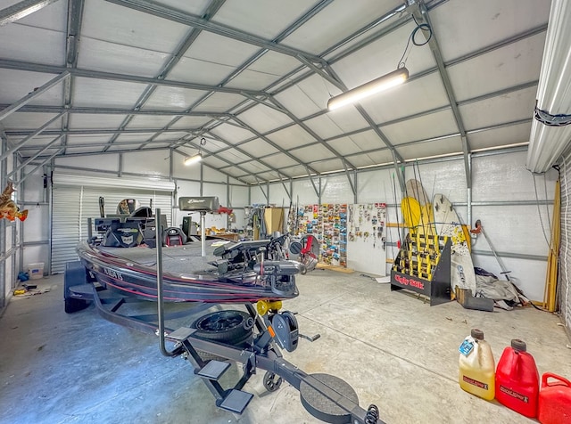 garage featuring a carport