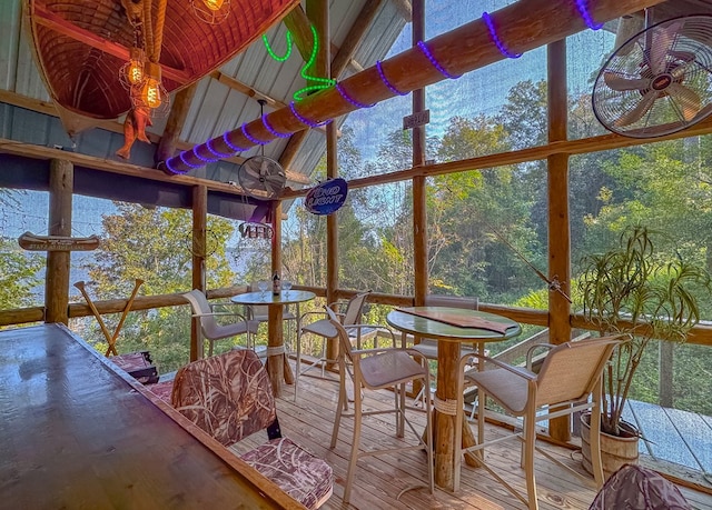 sunroom with lofted ceiling