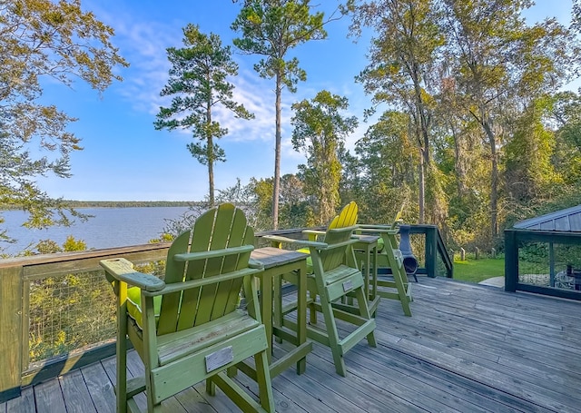 wooden terrace with a water view