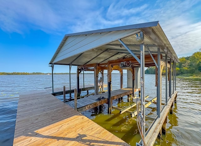 dock area with a water view