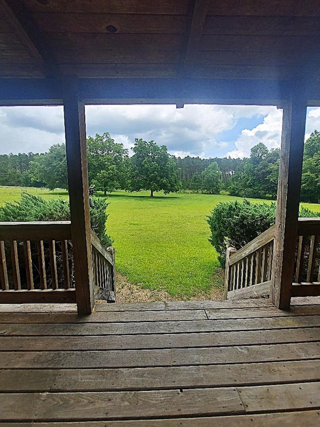 1210 Elkins Rd, Cairo, GA 39827 - deck with a yard