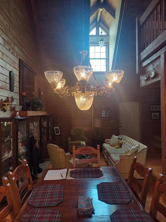 1210 Elkins Rd, Cairo, GA 39827 - dining space with high vaulted ceiling, a chandelier, and beamed ceiling