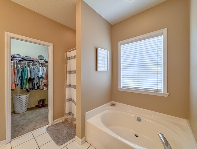 bathroom featuring independent shower and bath and tile patterned floors