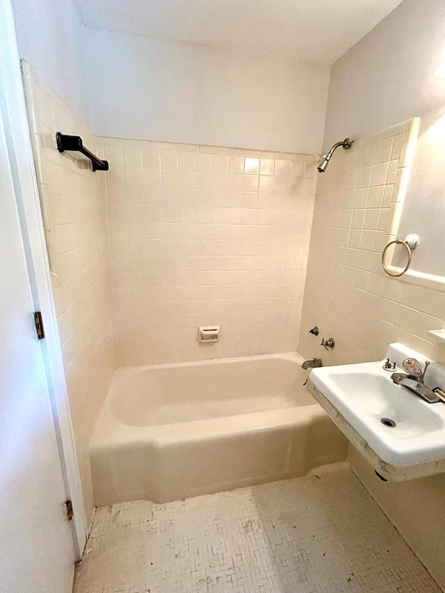 356 E Main St, Colquitt, GA 39837 - full bathroom with a sink,  shower combination, and tile walls
