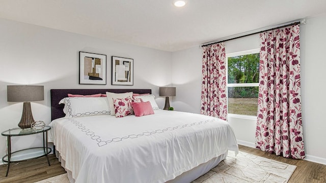 bedroom featuring hardwood / wood-style flooring