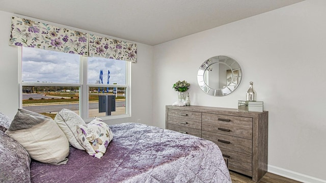 bedroom featuring hardwood / wood-style flooring