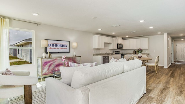 living room with hardwood / wood-style floors