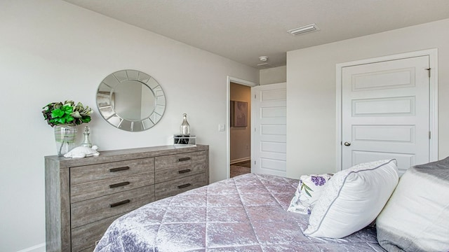 bedroom featuring a textured ceiling