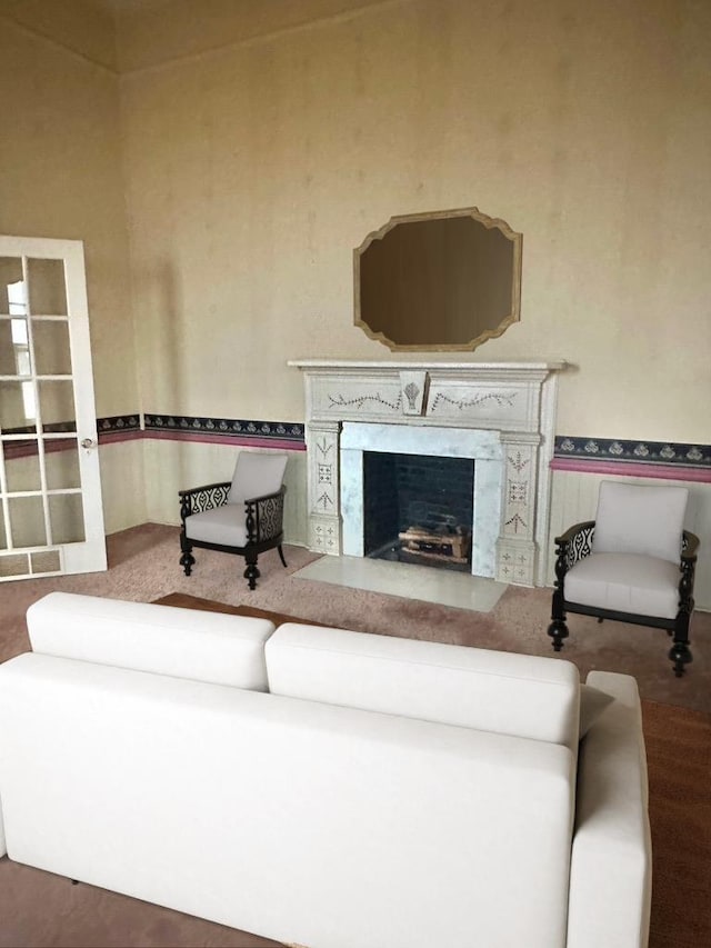 living room with visible vents and a premium fireplace