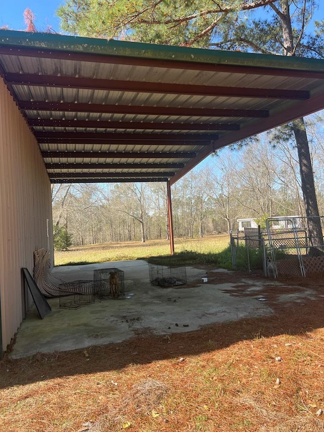 exterior space featuring a carport