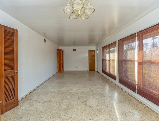 interior space with a chandelier