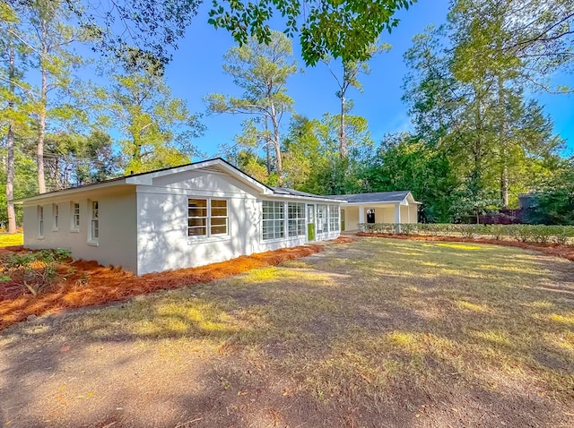 exterior space featuring a lawn