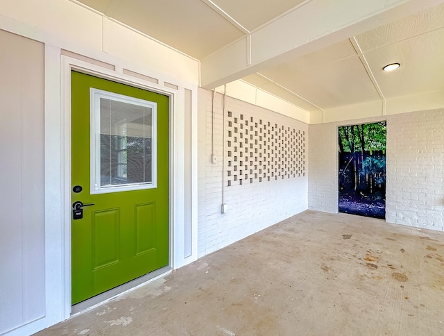 doorway to property with a patio