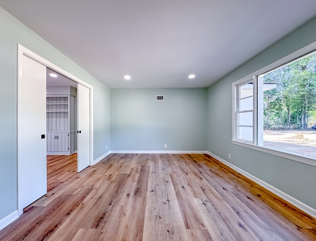 empty room featuring light hardwood / wood-style floors