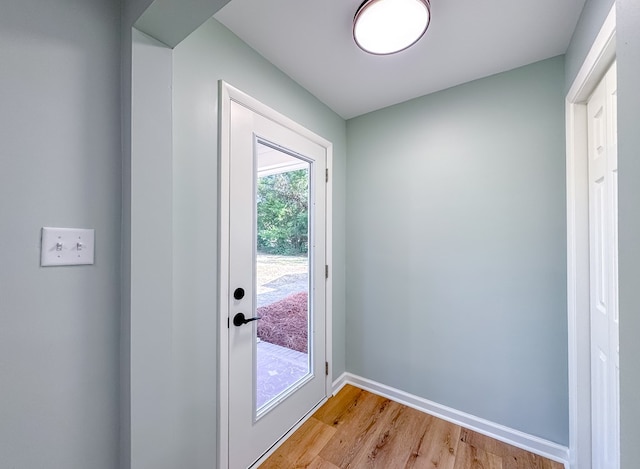 doorway with light hardwood / wood-style floors