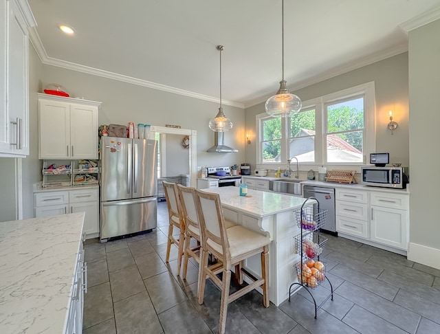 313 E Evans St, Bainbridge, GA 39817 - kitchen featuring stainless steel appliances, a sink, white cabinets, crown molding, and light stone countertops