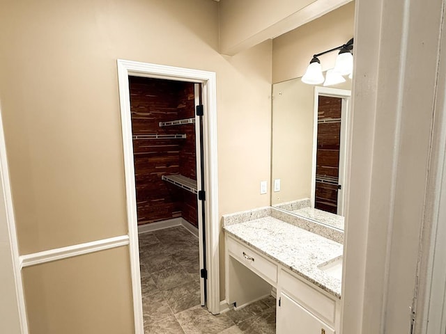 1870 SE Oakdale Rd, Cairo, GA 39828 - bathroom featuring baseboards and vanity