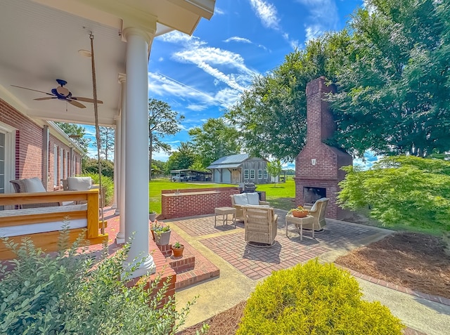 1267 Quincy Hwy, Attapulgus, GA 39815 - view of patio featuring an outdoor brick fireplace and ceiling fan