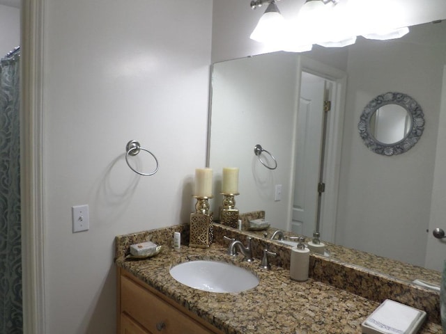 full bath featuring vanity