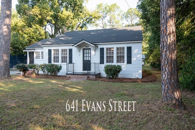 641 Evans, Bainbridge, GA 39819 - view of front of property featuring a shingled roof and a front lawn