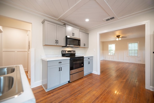 641 Evans, Bainbridge, GA 39819 - kitchen with stainless steel appliances, gray cabinets, dark wood-type flooring, light countertops, and crown molding