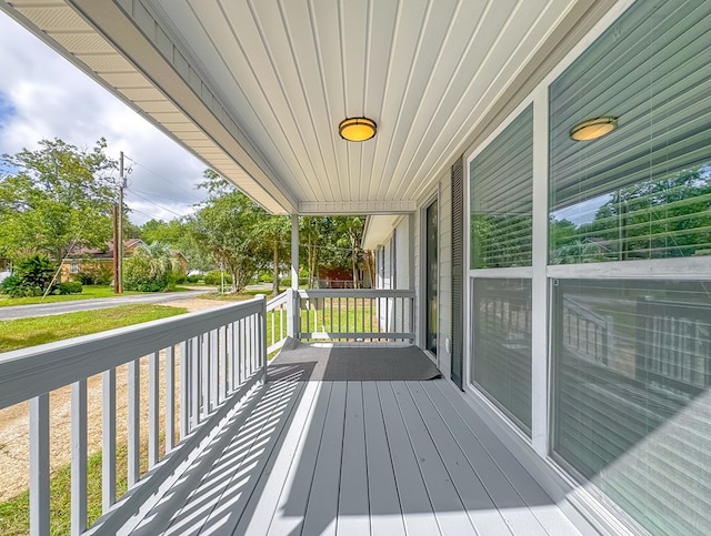 deck featuring covered porch