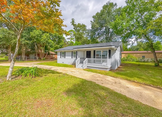 view of front of property with a front yard and a porch