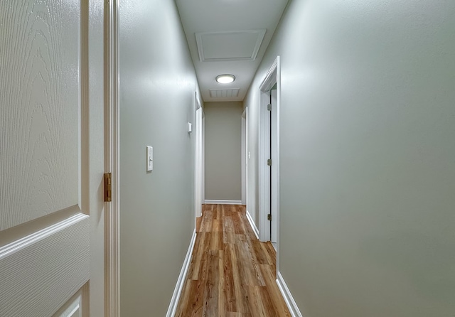 hall with light wood-type flooring