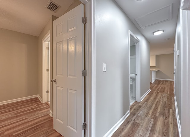 hallway featuring light hardwood / wood-style floors