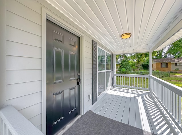 wooden terrace featuring a porch