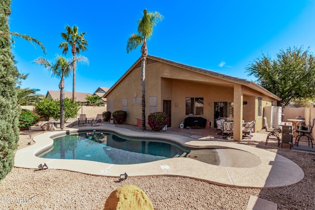 view of swimming pool featuring a fenced in pool, a patio, and fence